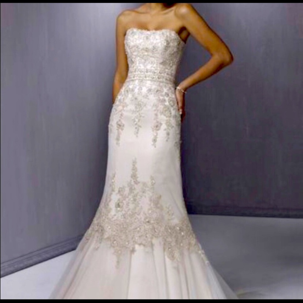 Maggie Sottero Slim A-Line Silhouette corset closure Wedding gown.